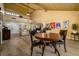 Spacious living room featuring vaulted ceilings, light wood floors, and stylish furnishings at 29844 Baywood Ln, Wesley Chapel, FL 33543