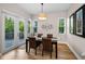 Dining room with hardwood floors and outdoor access at 2997 Eagle Estates E Cir, Clearwater, FL 33761