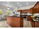 Kitchen with stainless steel appliances and granite countertops at 2997 Eagle Estates E Cir, Clearwater, FL 33761