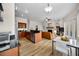 Open living space includes modern kitchen, Gathering room and dining nook at 2997 Eagle Estates E Cir, Clearwater, FL 33761