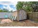 Backyard shed with outdoor seating area, perfect for relaxing and storage at 333 Acropolis Dr, Dunedin, FL 34698