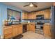 Well-equipped kitchen features stainless steel appliances, tile floors, and ample cabinet storage at 333 Acropolis Dr, Dunedin, FL 34698