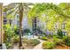 Lush courtyard view featuring a fountain and manicured landscaping, creating a peaceful retreat at 4221 W Spruce St # 1229, Tampa, FL 33607