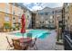 Beautiful pool with lounge chairs and tables, offering a perfect spot for residents to unwind at 4221 W Spruce St # 1229, Tampa, FL 33607