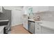 Charming kitchen featuring white cabinets, stainless steel appliances, and modern countertops at 4561 21St S Ave, St Petersburg, FL 33711