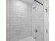 Tiled shower featuring white subway tile and shower head at 4561 21St S Ave, St Petersburg, FL 33711