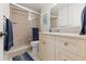 Bathroom with vanity, shower, and tile flooring at 4681 1St Ne St # 306, St Petersburg, FL 33703