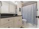 Full bathroom with vanity storage, granite countertops, and shower-tub combo at 4681 1St Ne St # 306, St Petersburg, FL 33703
