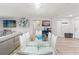 Bright dining area with glass table and seating for six at 4681 1St Ne St # 306, St Petersburg, FL 33703