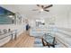 Spacious living room with a large sectional sofa and plenty of natural light at 4681 1St Ne St # 306, St Petersburg, FL 33703