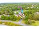 Beautiful condo aerial view featuring a well-maintained exterior, lush landscaping, and golf course views at 50 St Andrews Pl # 50, Oldsmar, FL 34677