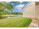 Backyard with a pond and view of the golf course at 50 St Andrews Pl # 50, Oldsmar, FL 34677