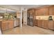 Bright kitchen featuring stainless steel appliances and ample cabinet space at 50 St Andrews Pl # 50, Oldsmar, FL 34677
