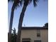 Exterior view of townhome with a bird standing on the roof at 501 East Bay Dr. # 2003, Largo, FL 33770