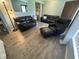 Inviting living room featuring tile floors, comfortable seating, and a neutral color palette at 501 East Bay Dr. # 2003, Largo, FL 33770