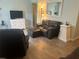 Cozy living area with a tile floors, a mirror and comfortable seating arrangement at 501 East Bay Dr. # 2003, Largo, FL 33770