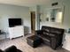 Cozy living area with a tile floors, a mirror and comfortable seating arrangement at 501 East Bay Dr. # 2003, Largo, FL 33770