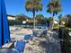 Community pool with plenty of lounge chairs and tennis courts at 501 East Bay Dr. # 2003, Largo, FL 33770