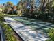 Enjoy a game of shuffleboard on this well-maintained community court surrounded by lush greenery at 501 East Bay Dr. # 2003, Largo, FL 33770