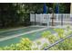 A view of the community shuffleboard court on a sunny day at 501 East Bay Dr. # 2003, Largo, FL 33770