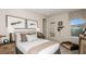 Inviting bedroom with fishing decor, comfortable bed, and a cozy ambiance at 5128 Slate Hue Pl, Apollo Beach, FL 33572