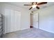 Bedroom with gray carpet and closet at 513 Tweed Ave, Seffner, FL 33584