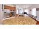 Eat in kitchen with stainless steel appliances, granite countertops, and lots of natural light at 513 Tweed Ave, Seffner, FL 33584
