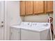 Convenient laundry room with side by side washer and dryer at 513 Tweed Ave, Seffner, FL 33584