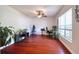 Office with wood floors and a variety of plants at 513 Tweed Ave, Seffner, FL 33584