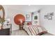 Bright bedroom featuring a modern boho decor with warm color accents and natural light at 5226 Salt Marsh Rd, Wimauma, FL 33598