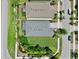 Overhead aerial view of a home with a lush lawn and landscaping at 5239 Admiral Pointe Dr, Apollo Beach, FL 33572