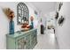 Hallway showcasing a decorative cabinet with a large decorative window above it at 5239 Admiral Pointe Dr, Apollo Beach, FL 33572