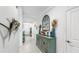 Bright hallway with coastal decorations and tile floors creates a welcoming entry at 5239 Admiral Pointe Dr, Apollo Beach, FL 33572