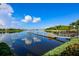 Picturesque waterfront pier offering tranquil views of the lake and surrounding natural beauty within the community at 5239 Admiral Pointe Dr, Apollo Beach, FL 33572