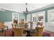 Elegant dining room featuring a round table, ornate chandelier, and neutral color scheme at 556 21St Ne Ave, St Petersburg, FL 33704