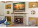 Stylish fireplace with nautical decor, built-in shelving, a mounted TV, and a cozy ambiance for relaxation at 556 21St Ne Ave, St Petersburg, FL 33704