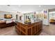 Open concept kitchen with large island, seamlessly connected to living area with natural lighting at 556 21St Ne Ave, St Petersburg, FL 33704