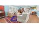 Cozy living room featuring a plush sofa, stylish armchairs, and decorative rug at 556 21St Ne Ave, St Petersburg, FL 33704