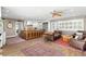Spacious living room featuring wood floors, oriental rugs, and a gourmet kitchen with stainless steel appliances at 556 21St Ne Ave, St Petersburg, FL 33704