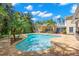 Beautiful backyard pool and spa area with lush tropical landscaping, ideal for relaxation and entertainment at 556 21St Ne Ave, St Petersburg, FL 33704