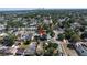 Aerial image featuring a home with tree coverage and a view of Tampa from a distance at 633 47Th N Ave, St Petersburg, FL 33703