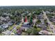 Aerial view showcases a home surrounded by lush greenery and the well-established residential area at 633 47Th N Ave, St Petersburg, FL 33703