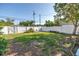 The backyard features a white fence surrounding the perimeter at 633 47Th N Ave, St Petersburg, FL 33703