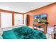 Spacious bedroom featuring wood-look floors and large closets at 633 47Th N Ave, St Petersburg, FL 33703