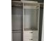 A Custom white closet storage system with shelves and drawers to maximize organization at 633 47Th N Ave, St Petersburg, FL 33703