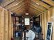 Inside the shed, shelving units provide ample storage space at 633 47Th N Ave, St Petersburg, FL 33703