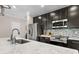 Kitchen with granite countertops, stainless steel appliances, and designer tile backsplash at 7513 S Sherrill St, Tampa, FL 33616