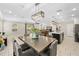Open floor plan showcasing the dining area, kitchen, and living room at 7513 S Sherrill St, Tampa, FL 33616