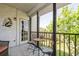 Charming balcony with outdoor seating and views of the backyard at 8198 Terrace Garden N Dr # 411, St Petersburg, FL 33709