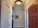 Welcoming entryway with arched doorways and neutral walls that lead into the other rooms at 832 King Leon Way, Sun City Center, FL 33573